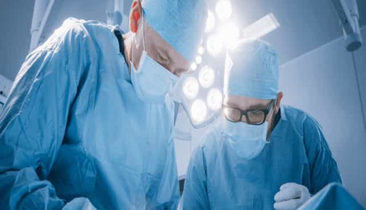 Surgeons operating